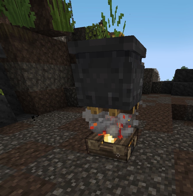 A cauldron on a campfire, used to collect blood.